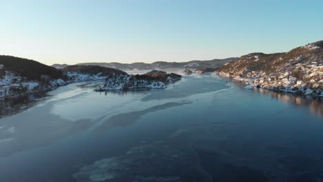 Calm-Freezing-Water-Of-Strait-Near-Kragerø-On-A-Sunny-Winter-Day-In-Norway