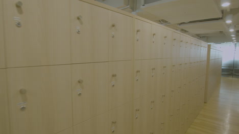 Dolly-In-Shot-In-A-New-and-Modern-Office-Locker-Area
