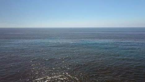 Landscape-of-Blue-Sky-and-Calm-Sea---aerial-drone-shot