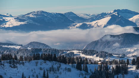 Timelapse-of-low-clouds-over-small-cabin-and-Chatel-Valley,-Avoriaz-Ski-Resort