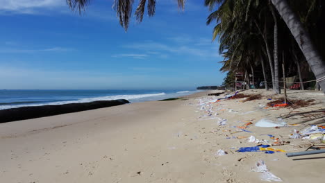 Geotube-on-Mui-Ne-beach-to-combat-beach-erosion,-marine-debris-on-beach