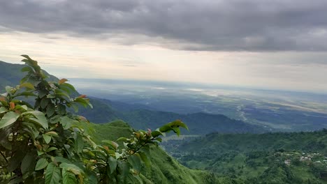 mountain-range-covered-with-forests-and-dramatic-cloudy-sky-at-morning