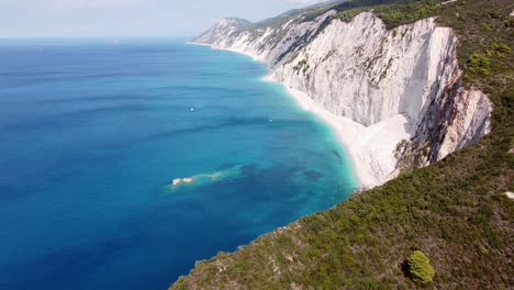 Aerial-Drone-View-Steep-Rocky-Cliffs,-Ionian-Lefkada-Island,-Greece---at-Porto-Katsiki-Beach