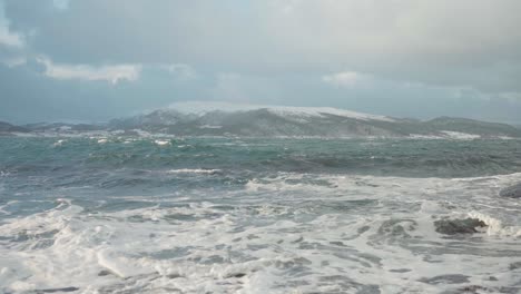 Foamy-Waves-Splashing-At-Trondheim-Fjord,-An-Inlet-Of-The-Norwegian-Sea-In-Indre-Fosen,-Trondelag,-Norway