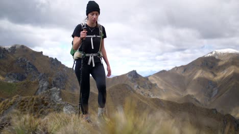 Girl-hiking-through-the-mountains-on-an-epic-adventure