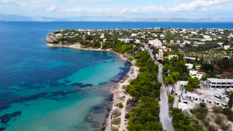 A-drone-view-of-the-beautiful-blue-Aegina-Island,-Saronic-Islands,-Greece