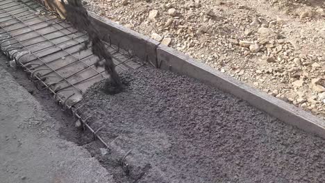 Process-of-installing-construction-of-new-sidewalks-laying-concrete-cement