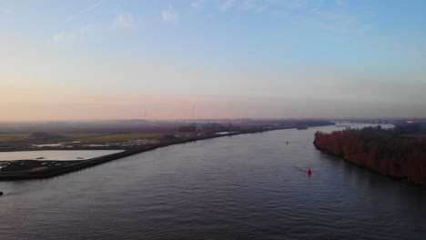 Aerial-Over-Oude-Maas-River-In-Puttershoek-In-The-Moring