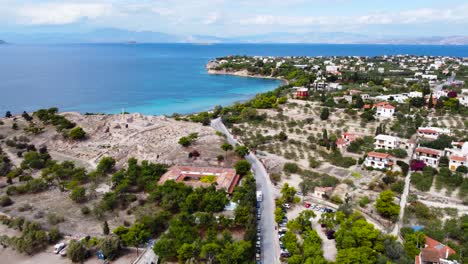 A-drone-view-and-fast-movment-of-the-blue-Aegina-Island,-Saronic-Islands,-Greece