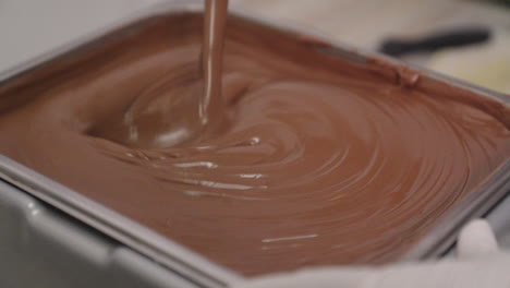 Stirring-Thick-Melted-Brown-Chocolate-with-a-Ladle,-Slow-Motion