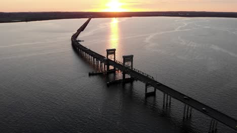 Cinematic-aerial-sunset-view-of-New-Youngs-Bay-bridge-connecting-Washington-and-Oregon-United-States