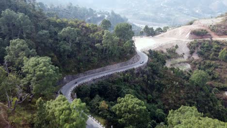 Drone-footage-of-the-BP-Highway,-Bardibas-Highway,-in-the-hills-and-mountains-of-Nepal