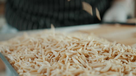 Hand-Cutted-Slivered-Almonds,-Rack-Full-of-Almond-Slives,-High-Quality-Blanched-Almond-Sticks