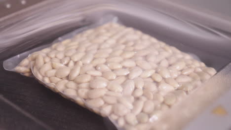 Vacuum-Sealing-a-Pack-of-Blanched-Almonds