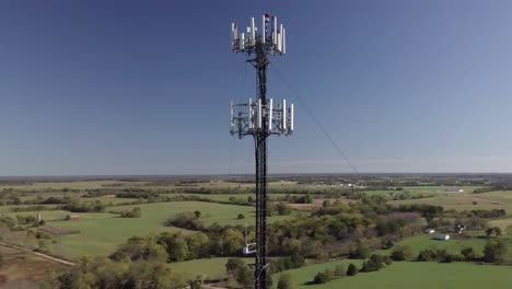 Rural-cell-phone-tower-in-the-middle-of-nowhere-with-5G-technology-updates-needed-stock-video-by-aerial-drone-footage-4