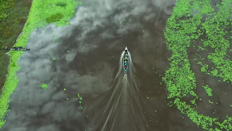 People-Traveling-by-Boat-on-Amazon-River-in-Peru---Aerial-Drone-View