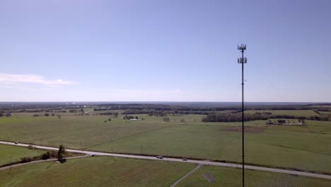 Rural-cell-phone-tower-in-the-middle-of-nowhere-with-5G-technology-updates-needed-stock-video-by-aerial-drone-footage-7