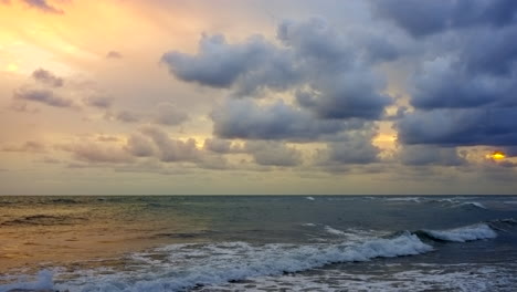 Ocean-waves-and-clouds-at-sunset