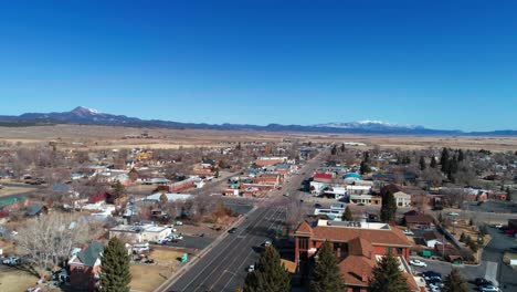 Aerial-drone-shot-down-the-main-street-of-a-small-ranch-town-in-Utah
