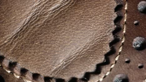 exquisite-leatherwork-and-stitching,-leather,-slow-slider