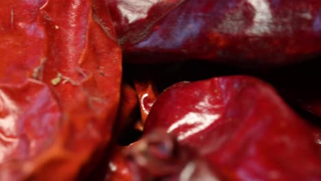 macro-view-of-dried-chilies-from-Mexico,-japones,-dried-chile-piment-seche,-right-to-left
