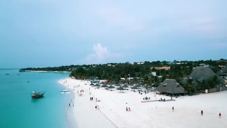 Perfect-aerial-drone-view-of-a-luxury-resort-hotel-on-a-scenic-tropical-island-in-paradise-dream-beach-Zanzibar,-Africa-Tanzania-2019
