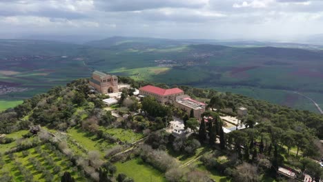 Drone-Shot-Above-single-house-on-a-mountain,-Mount-Tavor,-israel