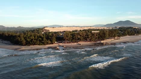 Aerial-Tracking-frame-right-of-coastline-at-La-Gi,-VIetnam