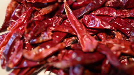 smooth-left-to-right,-plate-of-dried-chili-peppers,-Japones,-dried-Chile-Pigment-Seche