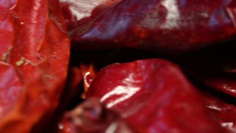 macro-view-of-dried-chilies-from-Mexico,-japones,-dried-chile-piment-seche,-left-to-right