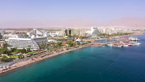 Aerial-footage-of-hotels-and-resorts-at-Eilat,-beautiful-city-at-south-Israel-on-the-Red-Sea-shore