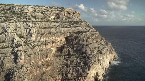 Panoramic-View-of-Mediterranean-Sea-Near-Blue-Grotto-with-Sky-Filled-with-Clouds