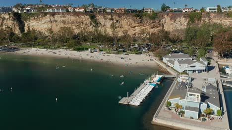 Rotating-aerial-view-of-Baby-Beach-in-Dana-Point,-California