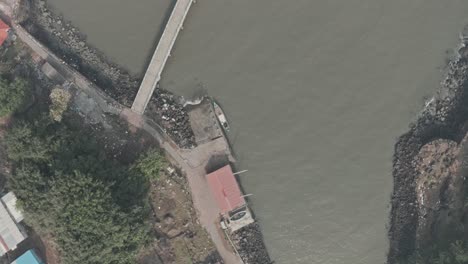 Rising-drone-shot-of-small-Indian-fishing-dock