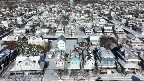 Aerial-of-small-town-America-covered-in-winter-snow