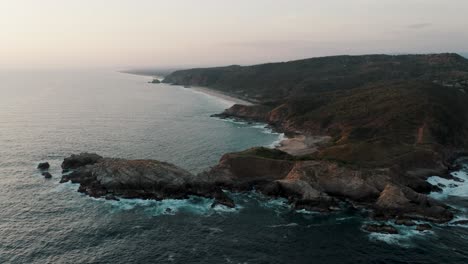 Seascape-View-Of-Cliffs-And-Ocean-In-Mazunte,-Mexico---aerial-drone-shot