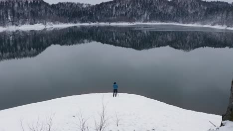 Photographer-Taking-a-Photo-On-a-Snow-Ice-Lake-3