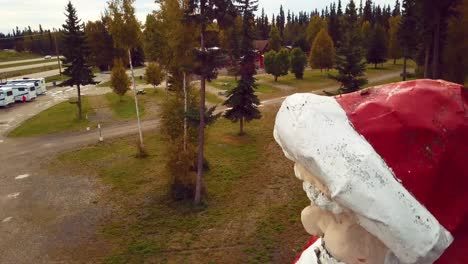 4K-Drone-Video-of-Santa-Claus-Statue-in-North-Pole,-Alaksa-during-Summer-Day