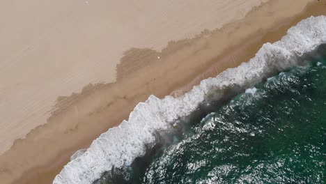 Waves-crashing-on-beach-near-Todos-Santos,-Mexico
