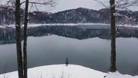Photographer-Taking-a-Photo-On-a-Snow-Ice-Lake-4