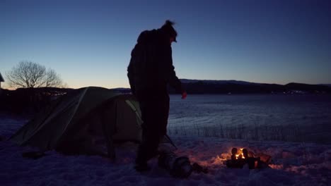 Camper-Walk-Towards-The-Campfire-At-Night