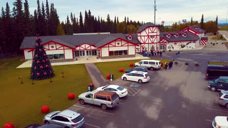 4K-Drone-Video-of-Santa-Claus-House-and-Gift-Shop-in-North-Pole,-Alaksa-during-Summer-Day