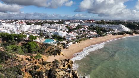 Albufeira-Waterfront-Architecture-Hotels---Algarve,-Ulbufeira,-Portugal---Stabilized-droneview-in-4K