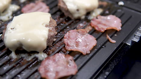 Burger---Grilling-Patties-With-Cheese-On-Electric-Griller-At-Home