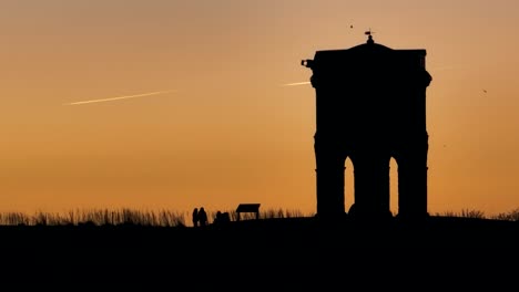 Chesterton-Windmill,-People-Silhouette,-Warwickshire-Aerial-Sunrise