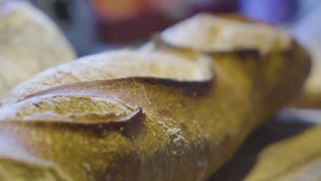 Freshly-baked-baguette-in-France-close-up-camera-movement-on-a-slider