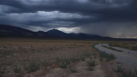 Rainclouds-gather-over-Great-Basin-National-Park-and-the-Snake-Mountain-Range-near-Baker,-Nevada