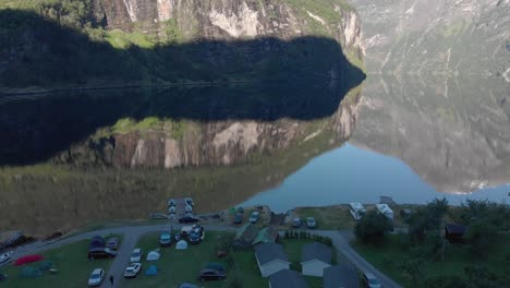 In-the-early-morning-the-drone-hovers-over-the-sleeping-campsite-in-Geiranger