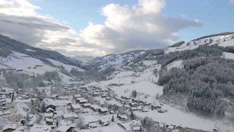 Aerial-shot-of-a-snow-covered-mountain-town
