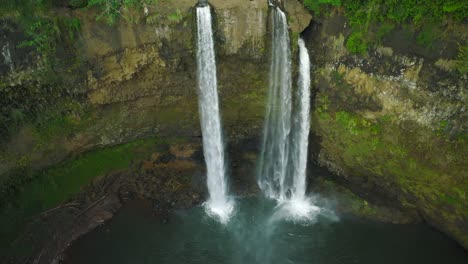 Aerial-Slow-Reveal-Wide-Shot-of-Opaekaa-Falls,-Daytime